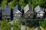 tilt-shift photography of house minitaure