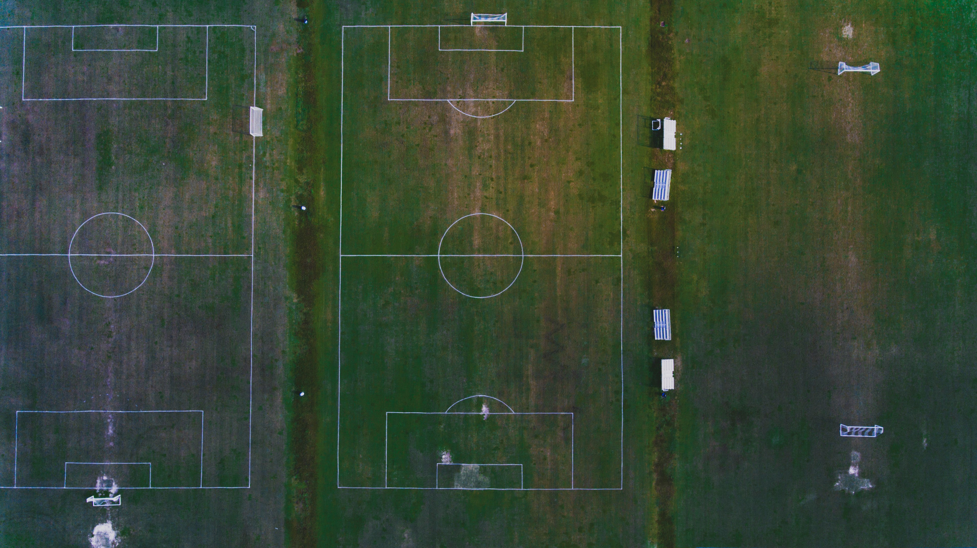 birds eye photography of two soccer fields
