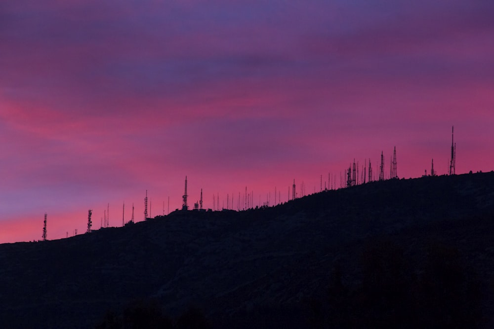 silhouette of mountain during dawn