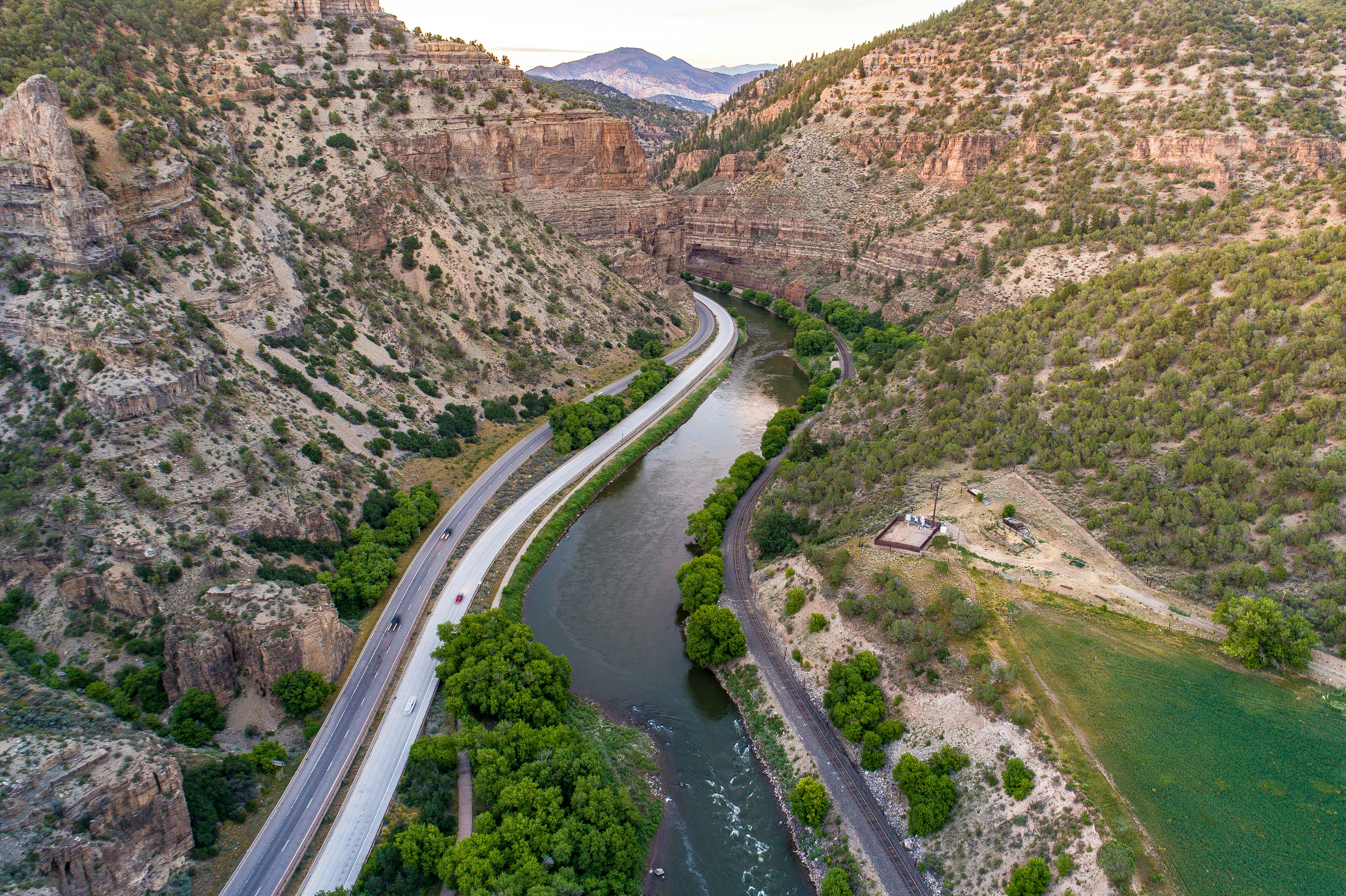 gray asphalt road under sunny sky, 