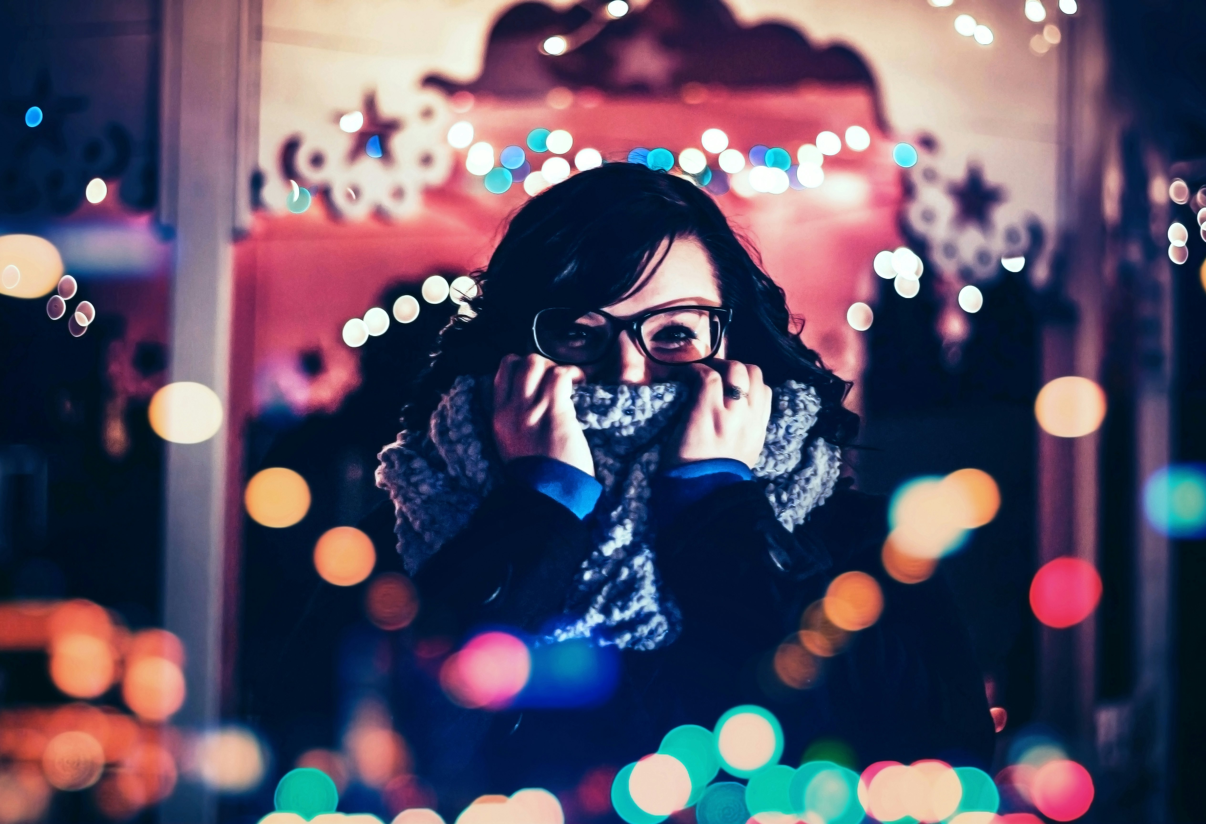 woman covered her face with scarf photo with bokeh background