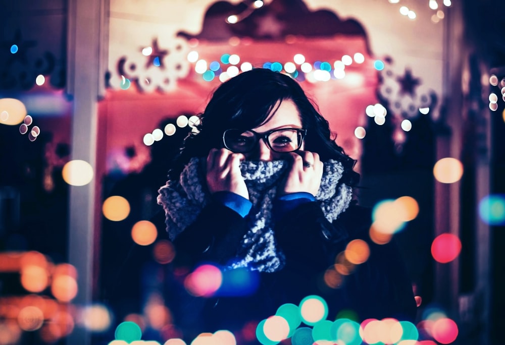 woman covered her face with scarf photo with bokeh background