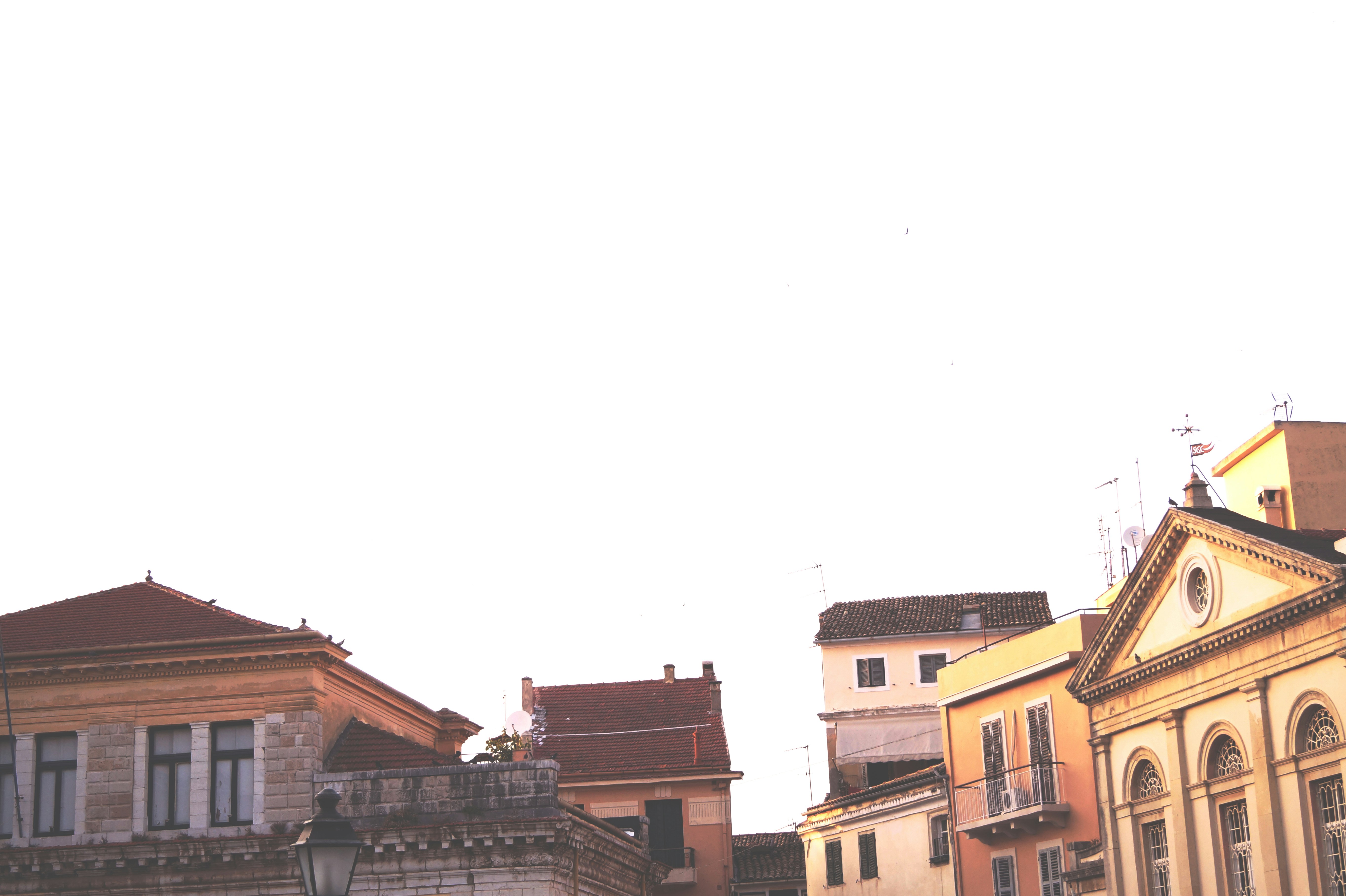 Historic architecture in the old town area of Constanța bathed in warm afternoon light.