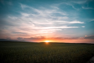 horizon showing sunrise to begin day of solar power collection.