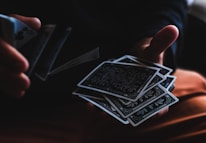 person playing with cards