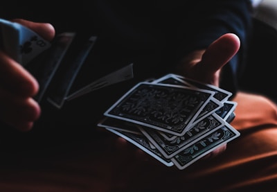 person playing with cards