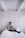 A thoughtful woman using a laptop in a cozy home setting, representing a mindful internet user.