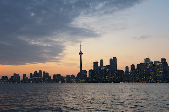 landscape photography of city building near body of water in CN Tower Canada