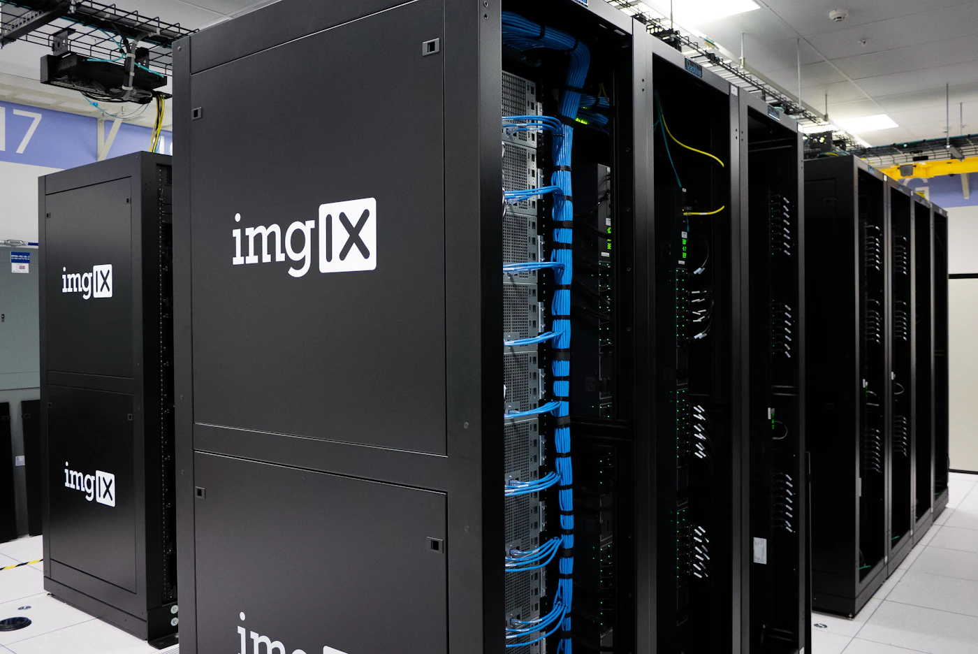 Black server units with indicator lights in a production data centre