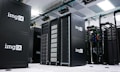 img IX mining rig inside white and gray room