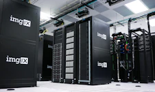 A modern cloud server room with glowing data racks symbolizing digital solutions.