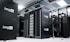 A room filled with sleek black server racks, arranged neatly in rows. The servers are part of a data center with visible structured wiring and ceiling cable trays. Bright overhead lighting illuminates the space, adding to the modern high-tech environment.