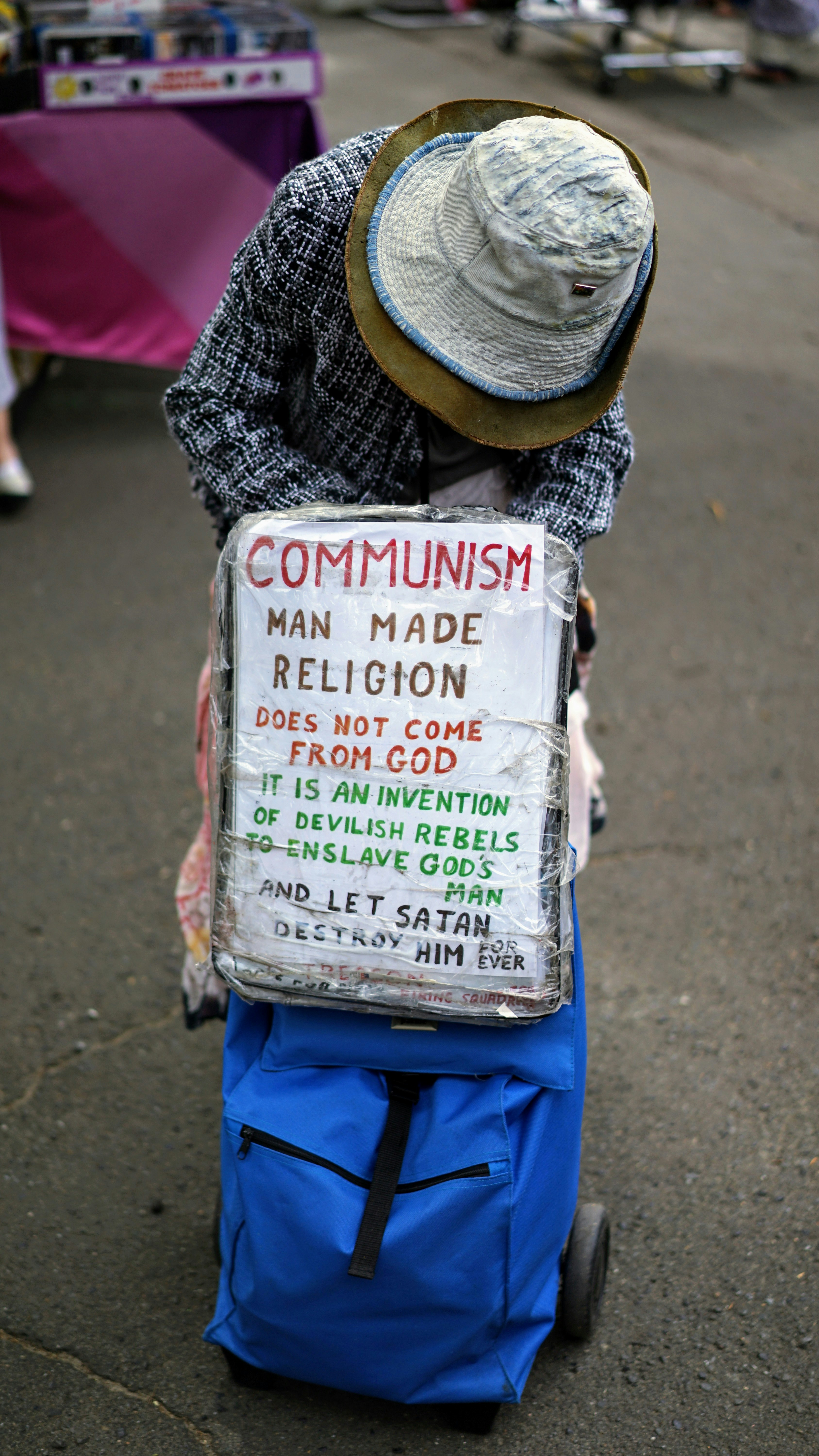 Part of a continuing project to photograph the colourful people in and around Rozelle in Sydney Australia. This old lady has a clear point of view. After visiting this same spot every weekend for about 3 years, I’ve never seen her again.