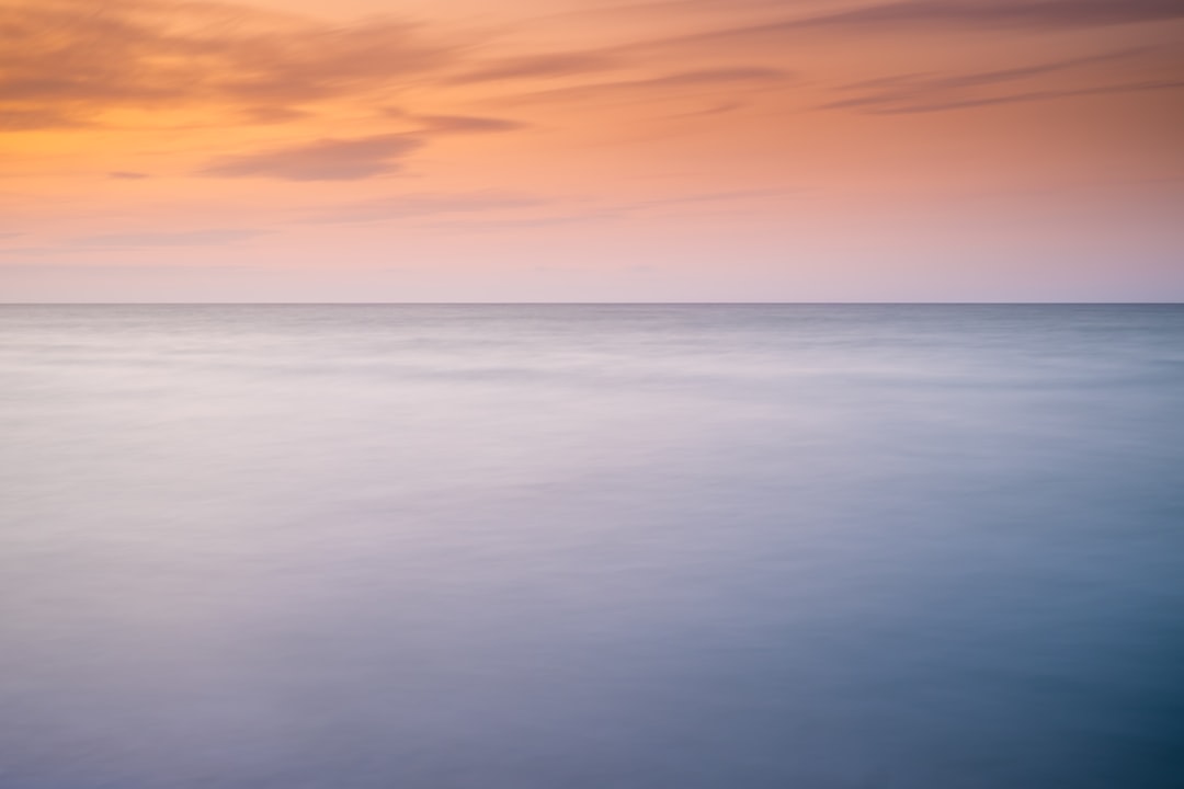 seascape photography of sunset