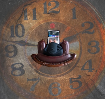 brown analog clock