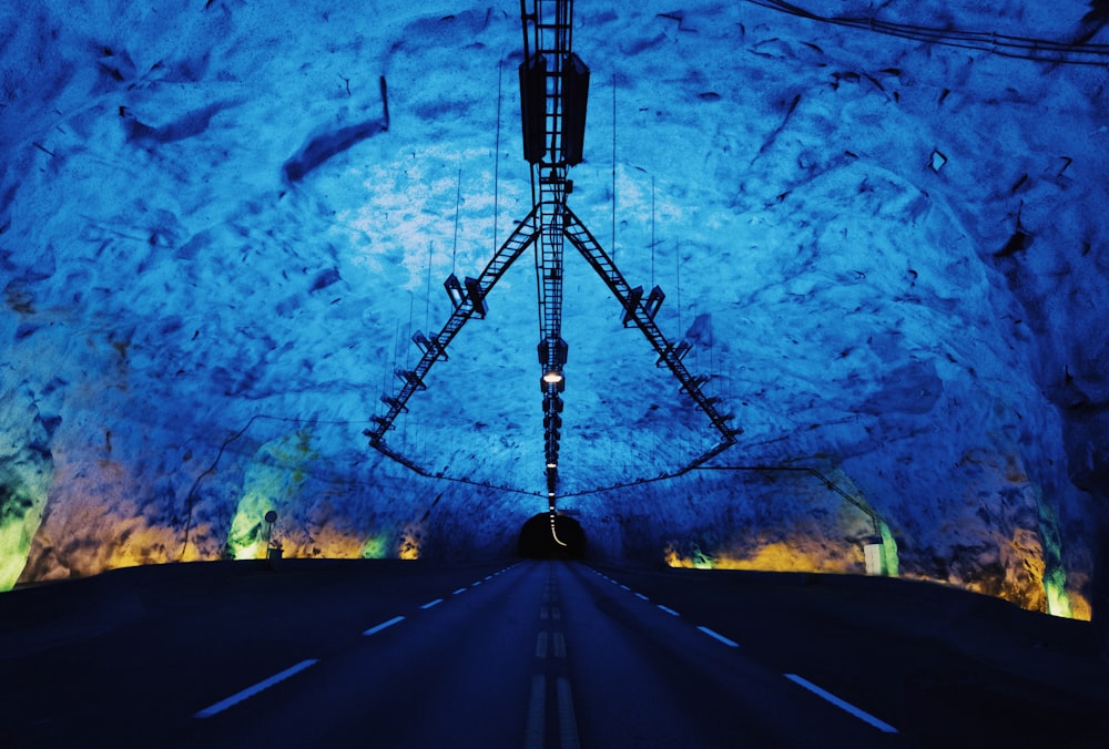 empty pave road with lighting