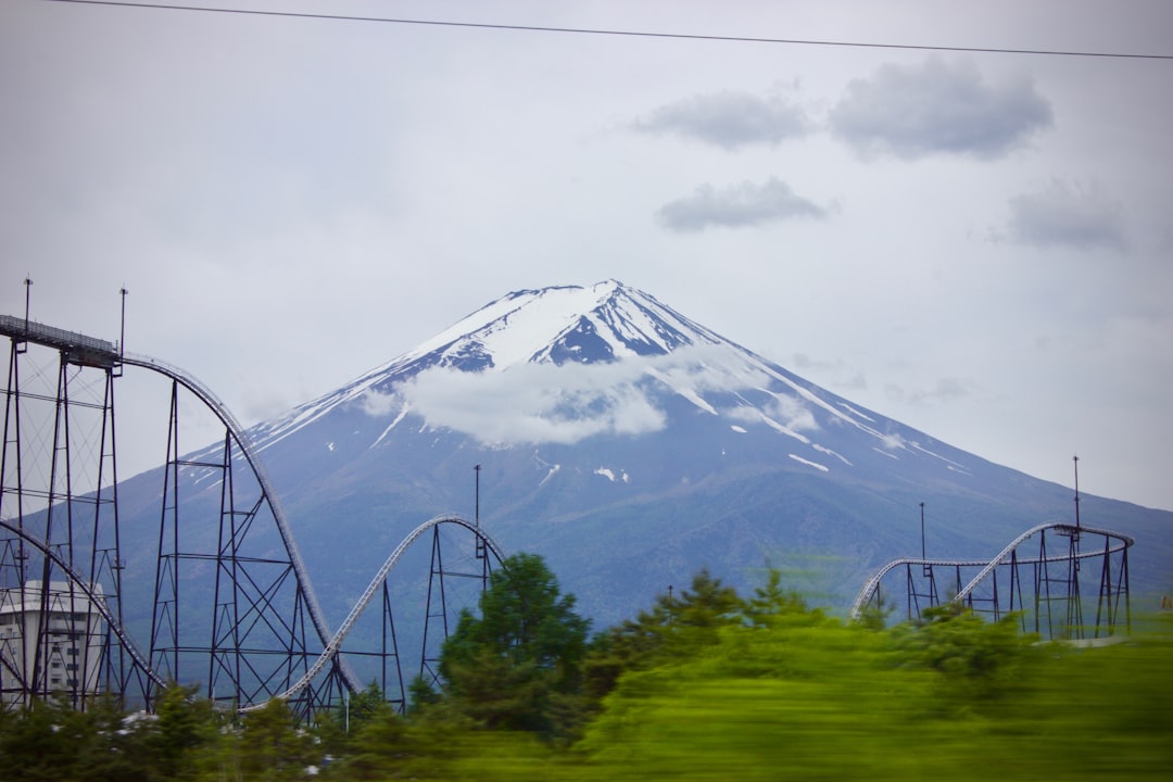 It was 9:30 in the morning. We were on the way to Mt. Fuji. After 150 miles we glimpsed the volcanic mountain for the 1st time. There was no way I was going to miss the opportunity to capture the first glimpse of this majestic mountain, so I took this photo from the bus.