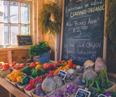 variety of vegetables display with Certified Organic signage