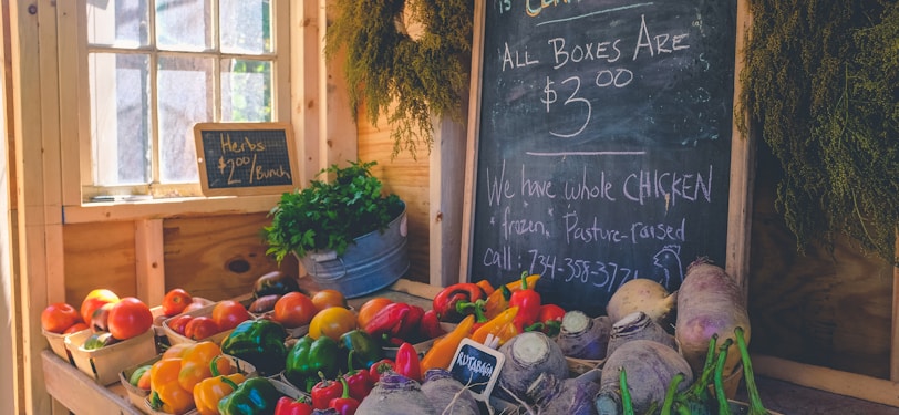 variety of vegetables display with Certified Organic signage