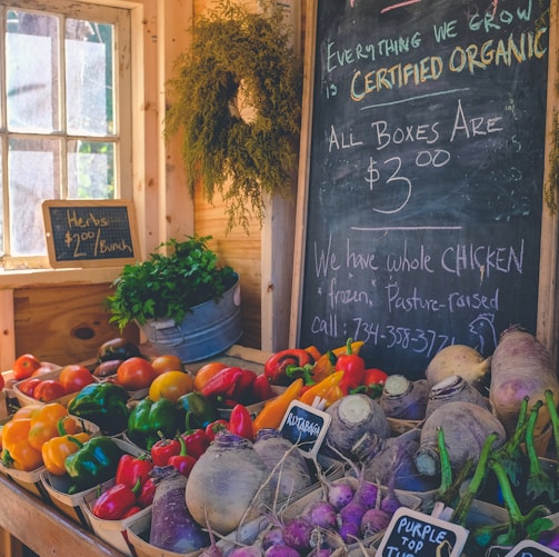 variety of vegetables display with Certified Organic signage