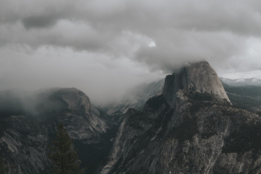 aerial view photography of mountain under clouds