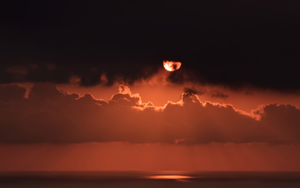 photography of red moon