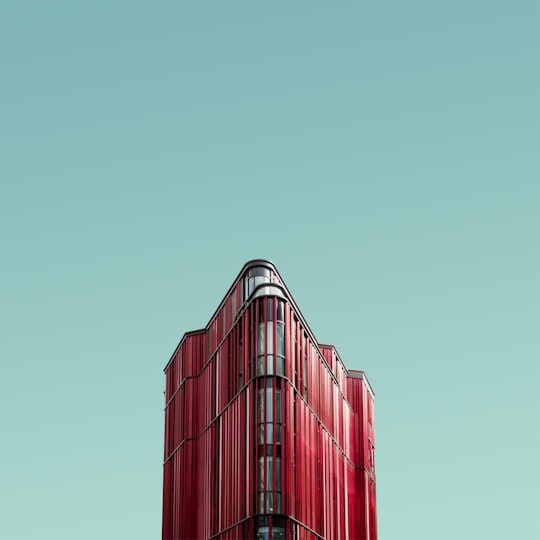 worm's eye view photography of red glass building in Oxford Street United Kingdom