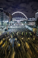 panning photo of men riding horses race