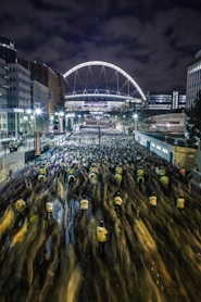 panning photo of men riding horses race
