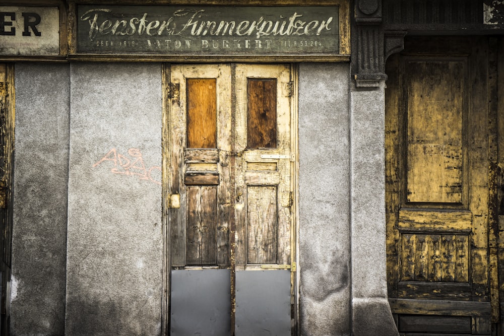 shallow focus photography of brown wooden door