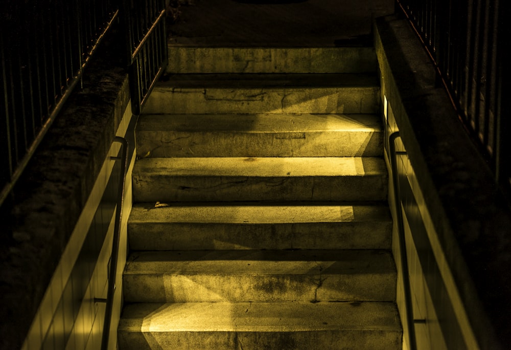 a set of stairs lit up at night