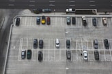 aerial view of cars parked on parking lot