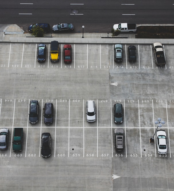 aerial view of cars parked on parking lot