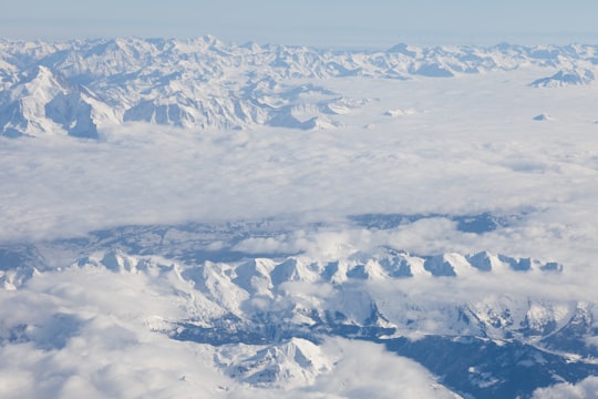 aerial view of snow covered mountains in Swiss Alps Switzerland