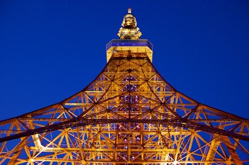 Panoramic image of a steel structure integrated into an urban building facade at sunset.