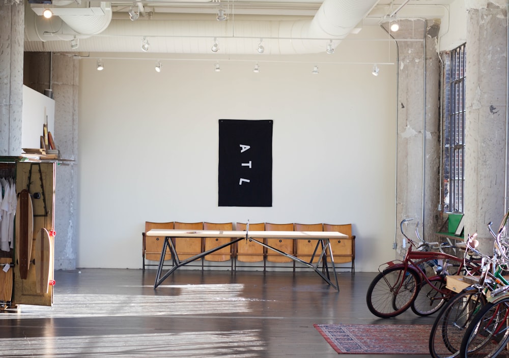 brown wooden table inside the room