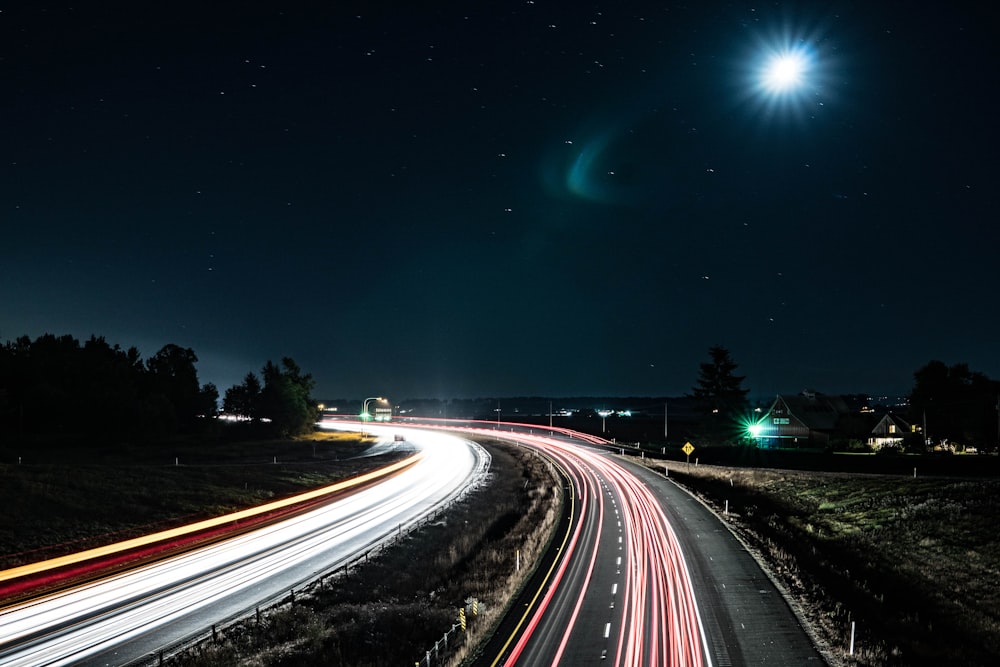 time lapse photography of cars on road