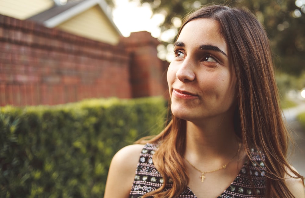 smiling woman taking selfie