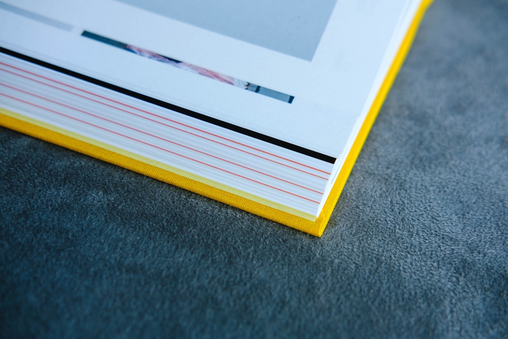 white book page with yellow cover