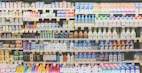 assorted drinks on white commercial refrigerator