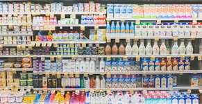 assorted drinks on white commercial refrigerator