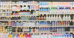 assorted drinks on white commercial refrigerator