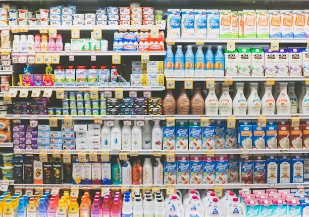 assorted drinks on white commercial refrigerator