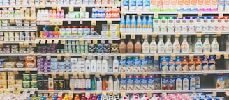 assorted drinks on white commercial refrigerator