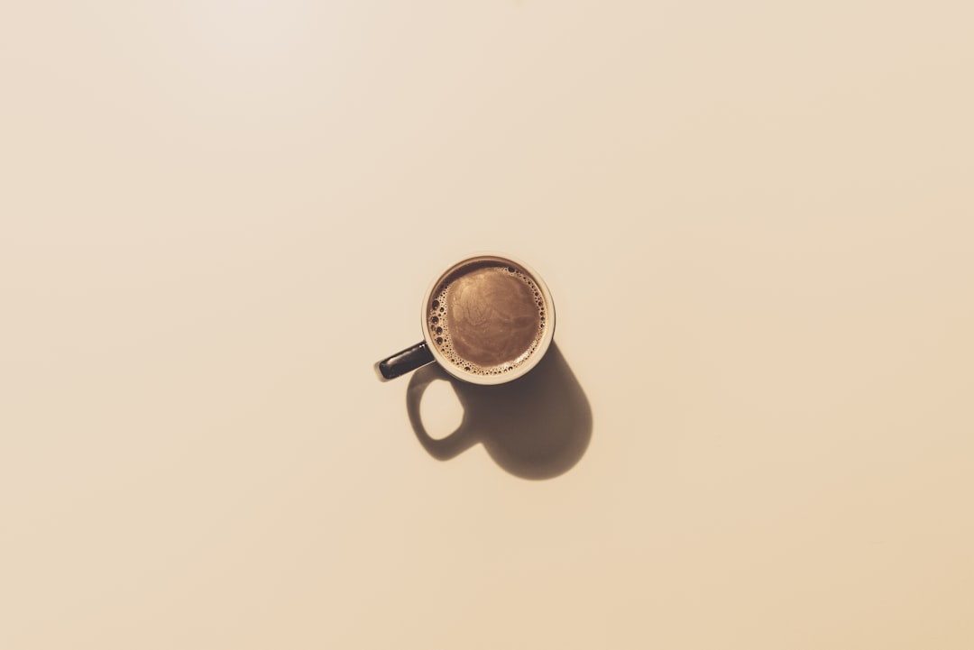 brown ceramic teacup,