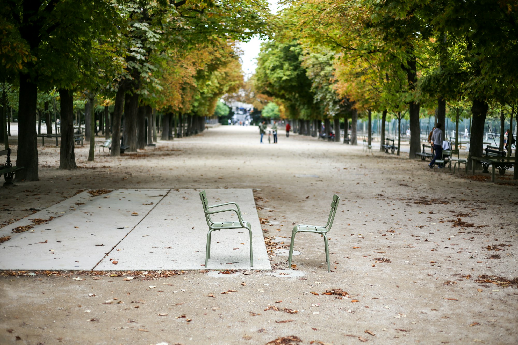 I was walking around the Luxembourg Gardens in Paris, and stumbled upon these curiously placed park chairs.