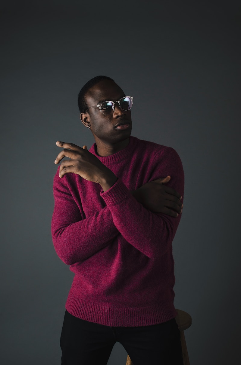 Moody low-key portrait — editorial look, deep shadows