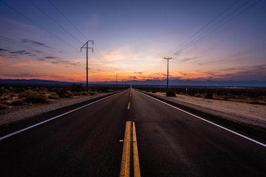 empty road during golden hour in Death Valley National Park United States