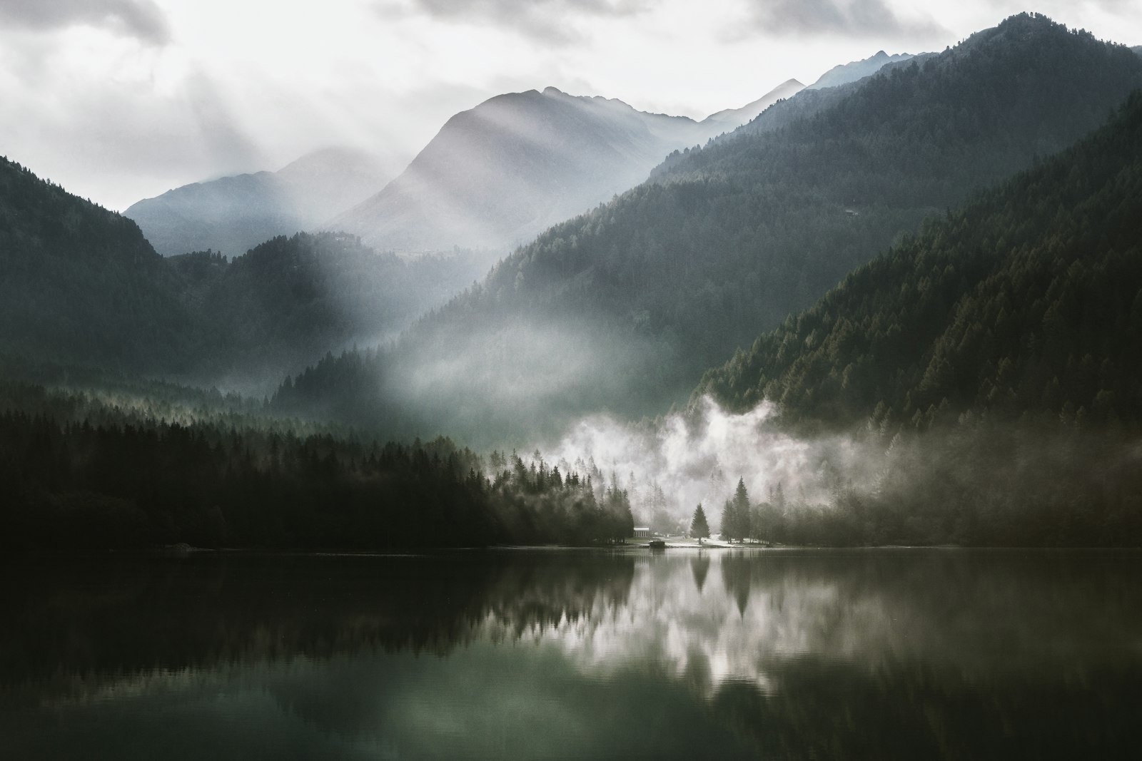 Canon EOS 70D + Tamron AF 28-75mm F2.8 XR Di LD Aspherical (IF) sample photo. Mountain across lake under photography