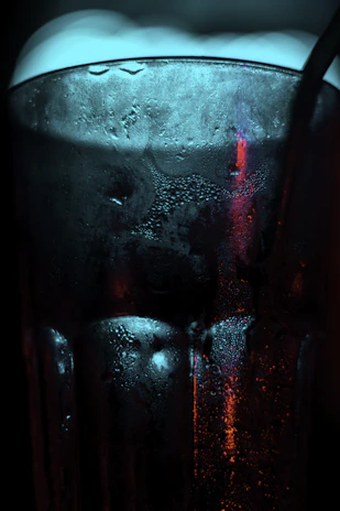 Close-up of a frosty beverage with condensation on the glass.